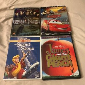 4 Disney/Pixar DVDs Cars, pirates 3, James the giant peach sword and the Stone